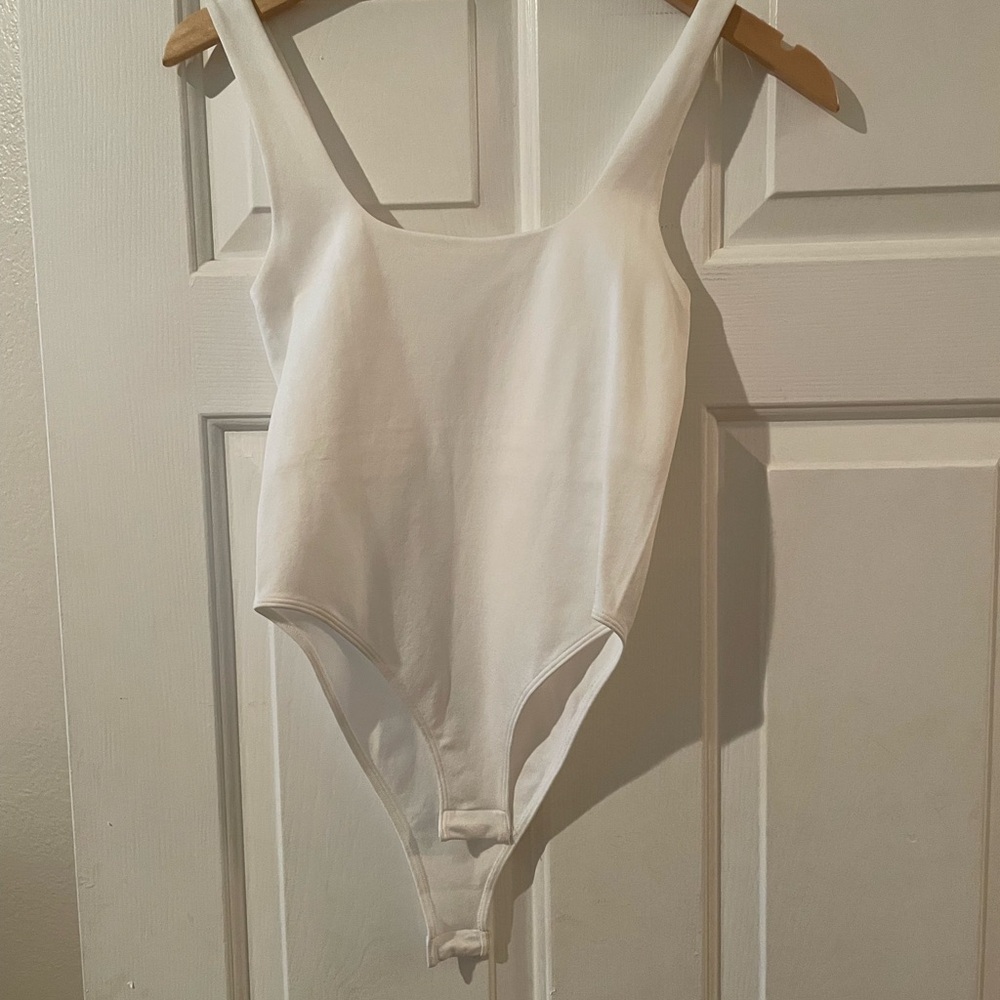 a new day White Scoop Neck women’s or junior’s One-Piece Bodysuit